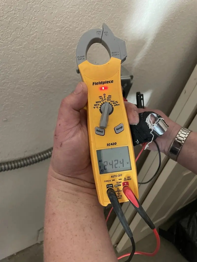 Voltage testing with clamp meter during Generator Installation in Towson